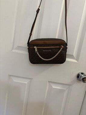 Michael Kors Brown Signature Crossbody Bag gently used